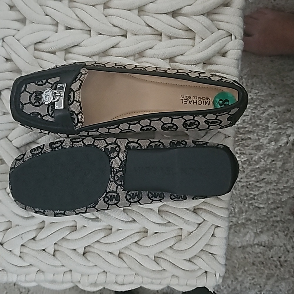 Michael Kors size 8 black and and gray loafers with silver locket, rubber soles